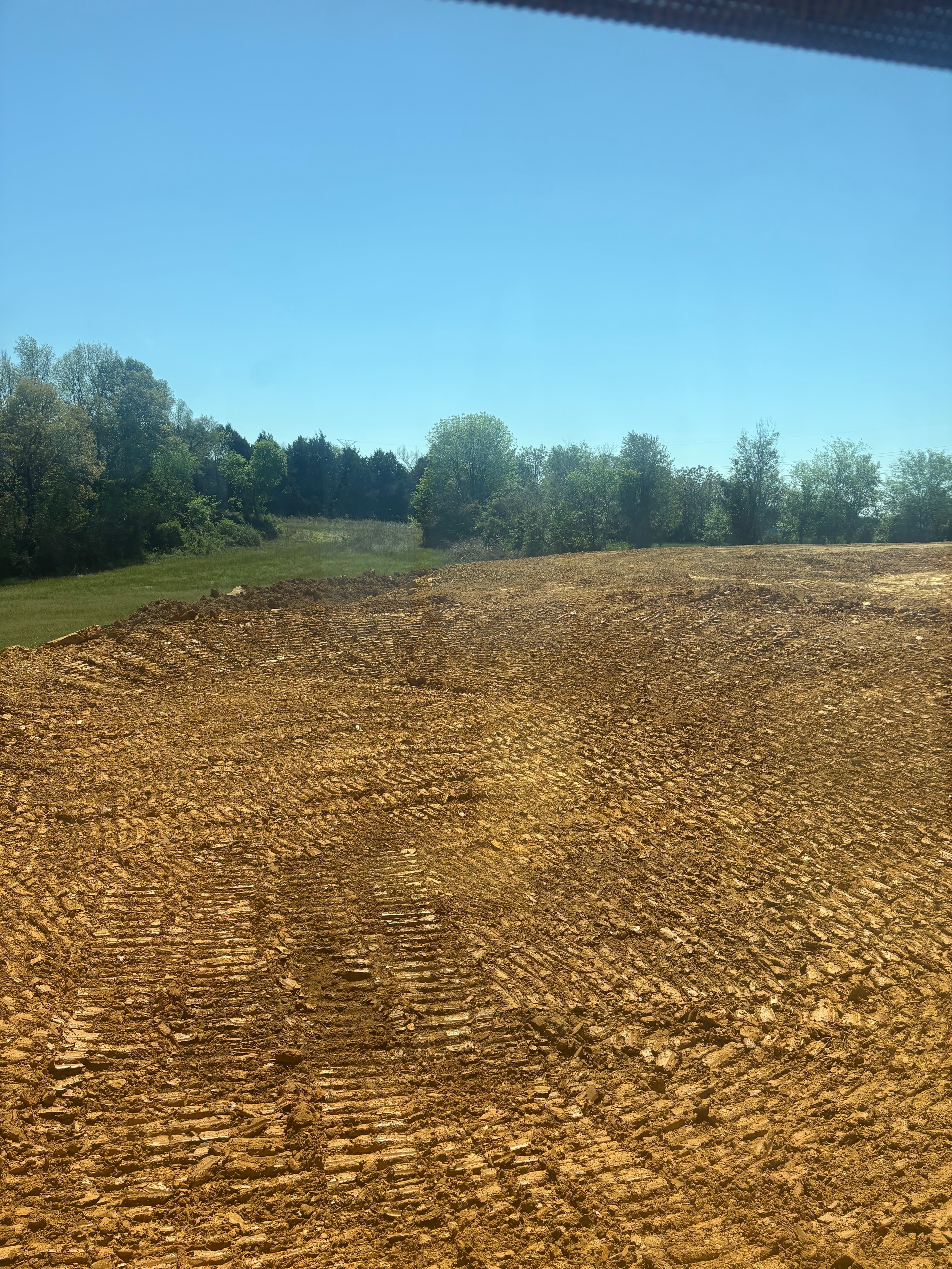Excavator on rural property